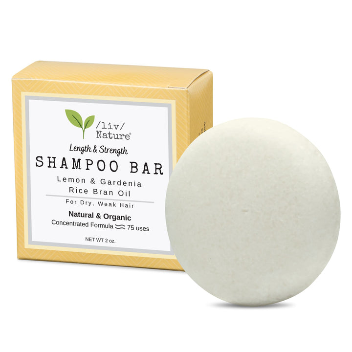 Liv Nature lemon gardenia-scented shampoo bar in eco-friendly packaging, designed to strengthen and nourish dry, damaged hair, made with natural ingredients, travel-size.